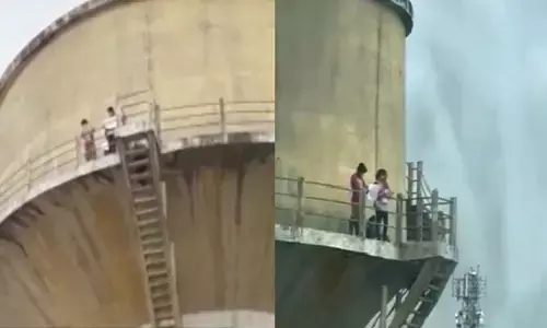 Bhopal News: Youth climbed 80 feet high water tank with family, demanding removal of possession of goons from land