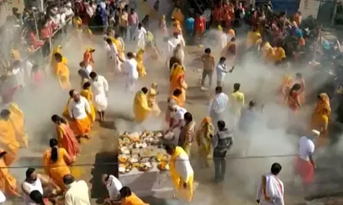 Devotees walk on burning embers after worshiping to get desired results here in MP Devotees walk on burning embers after worshiping to get desired results here in MP